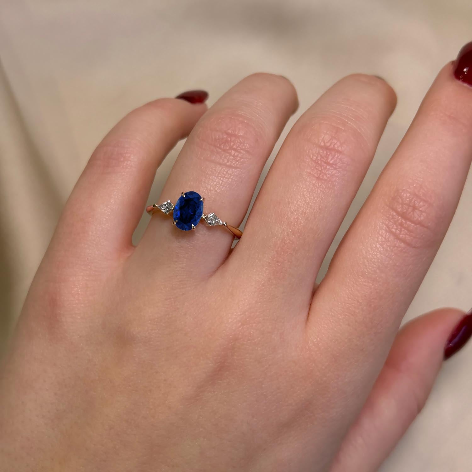 Oval Cut Three Stone Blue Sapphire Engagement Ring