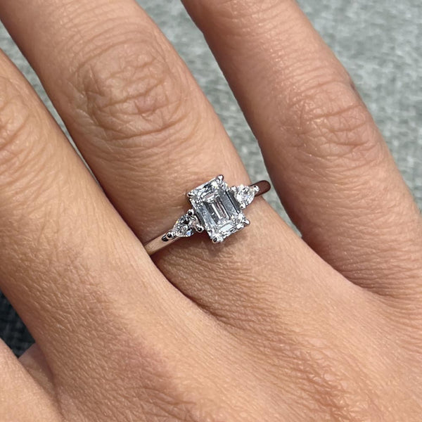1.25 Carat Three Stone Emerald Shape Moissanite Engagement Ring