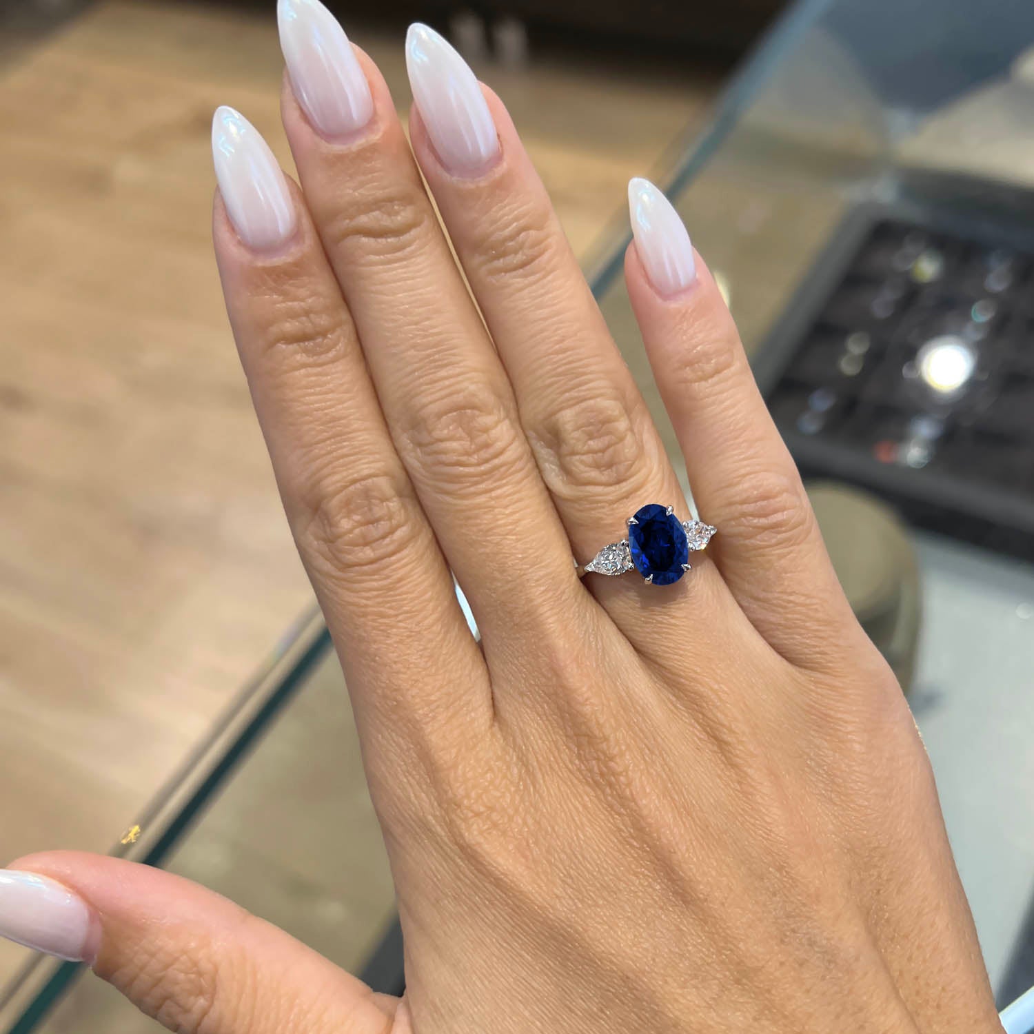 Oval Cut Three Stone Blue Sapphire Engagement Ring