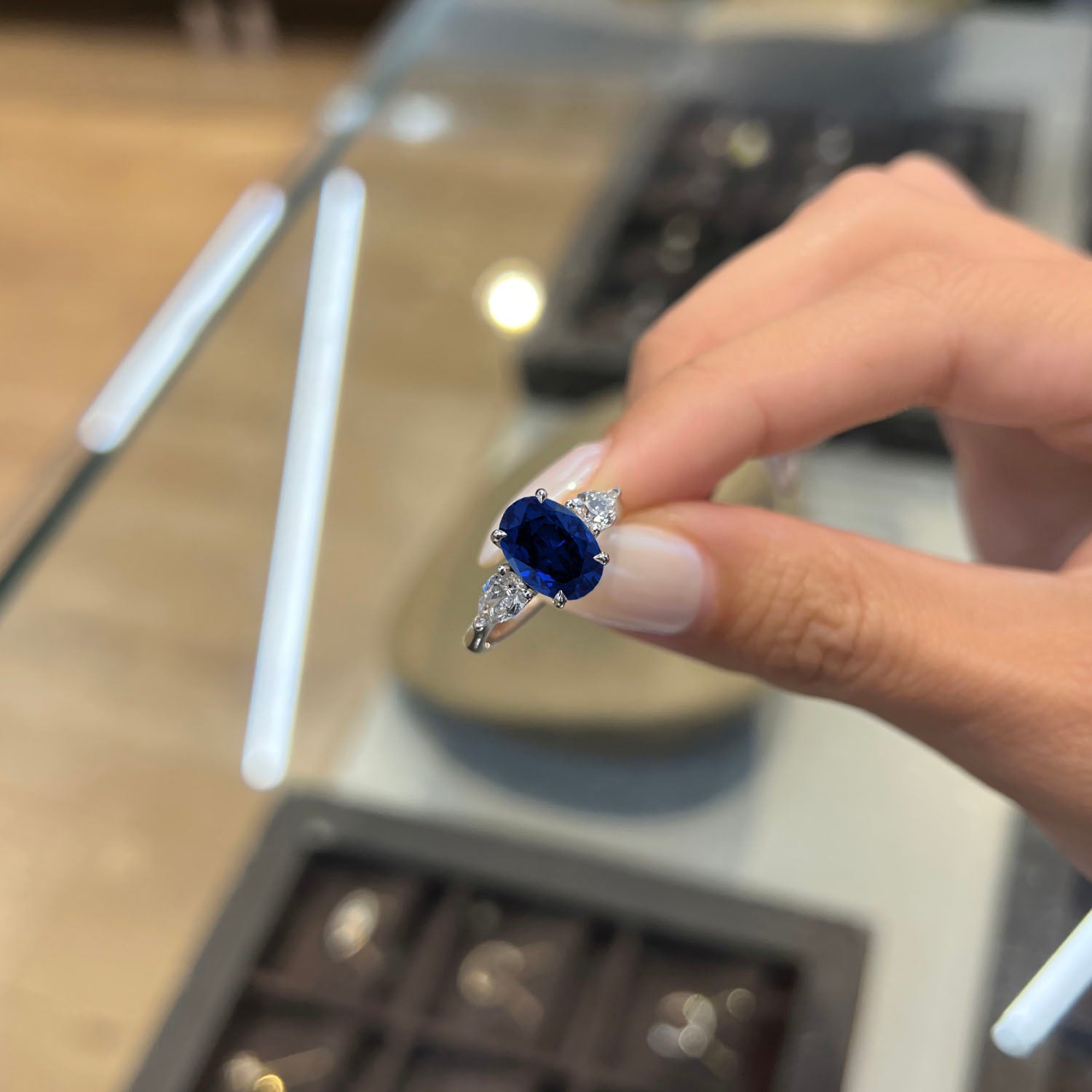 Oval Cut Three Stone Blue Sapphire Engagement Ring