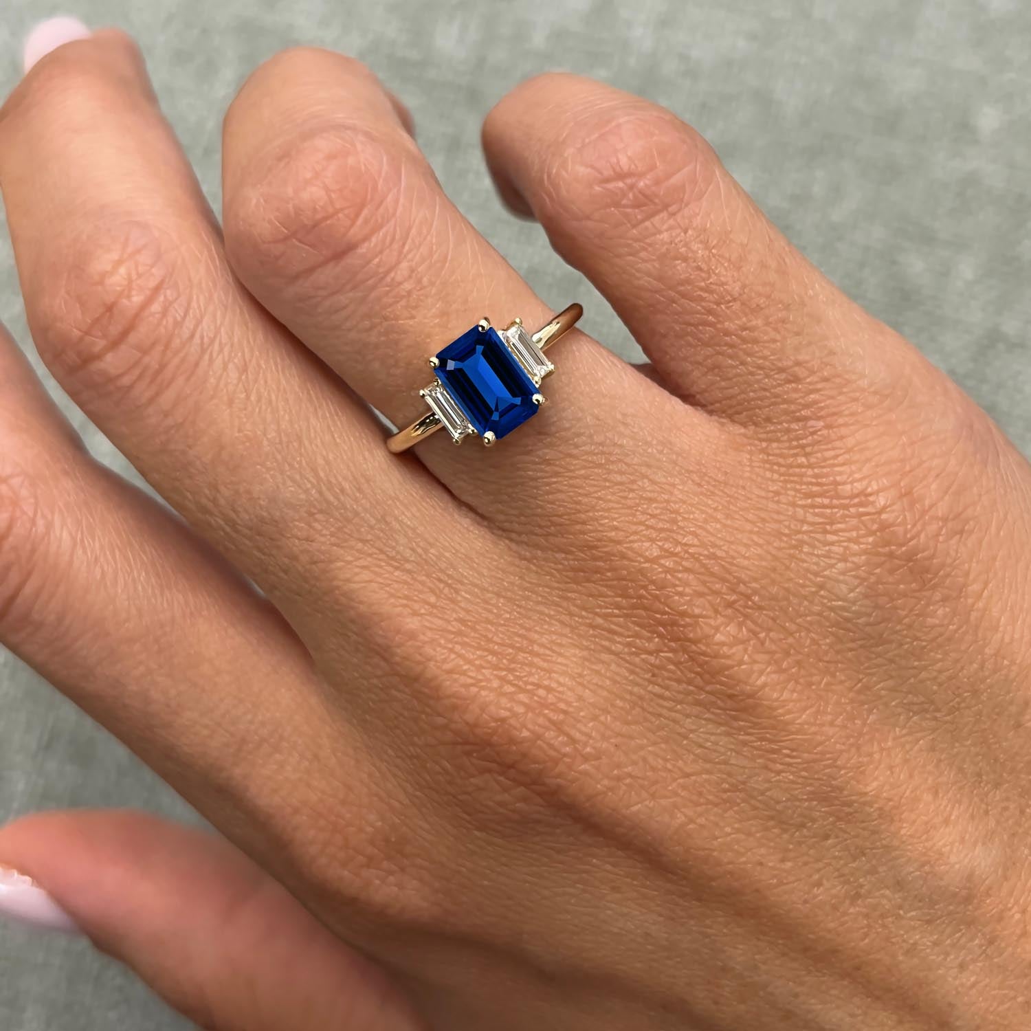 Emerald Cut Three Stone Blue Sapphire Engagement Ring