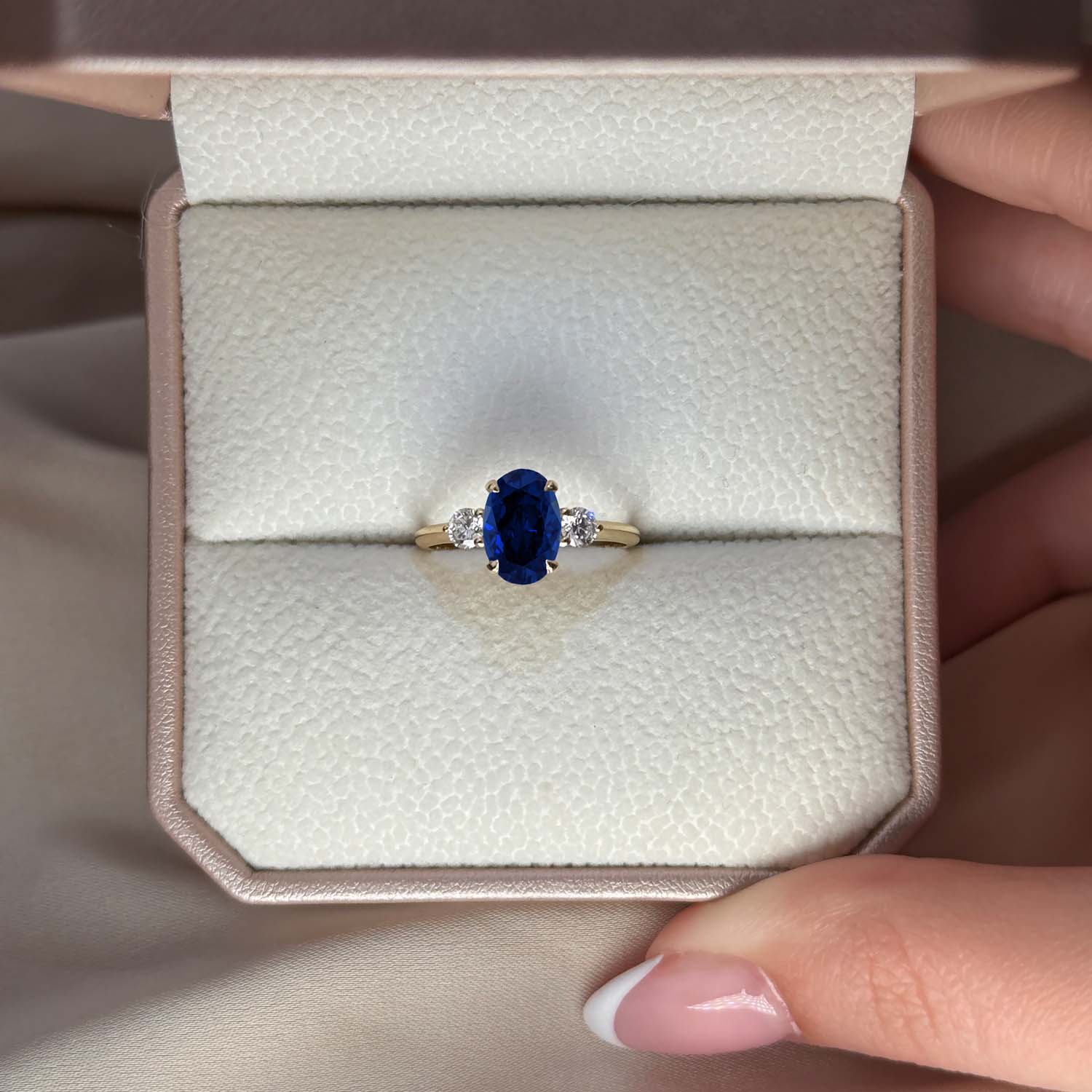 Oval Cut Three Stone Blue Sapphire Engagement Ring