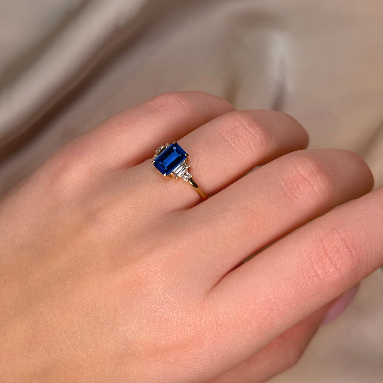 Emerald Cut Three Stone Blue Sapphire Engagement Ring