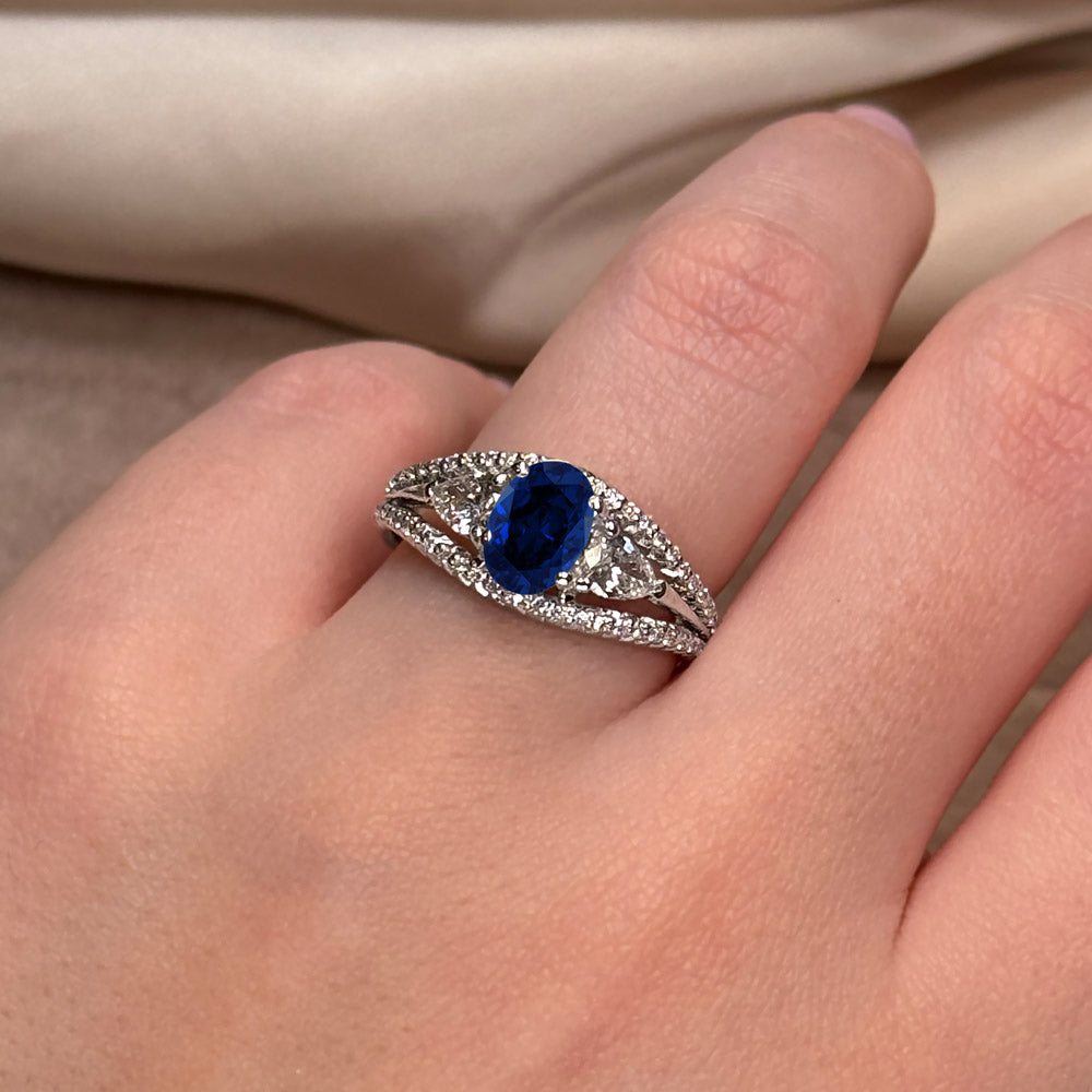 Oval Cut Three Stone Blue Sapphire Engagement Ring
