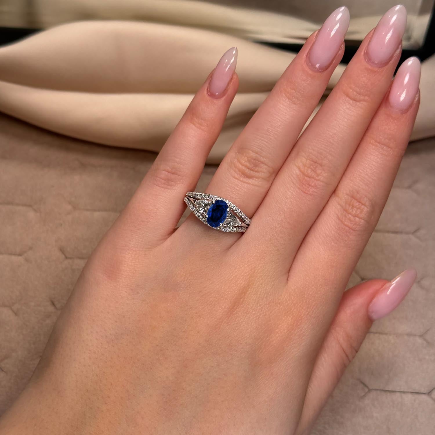Oval Cut Three Stone Blue Sapphire Engagement Ring
