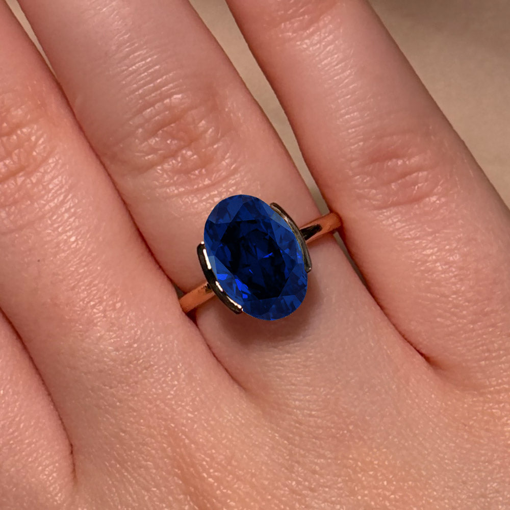 Oval Cut Half Bezel Blue Sapphire Engagement Ring