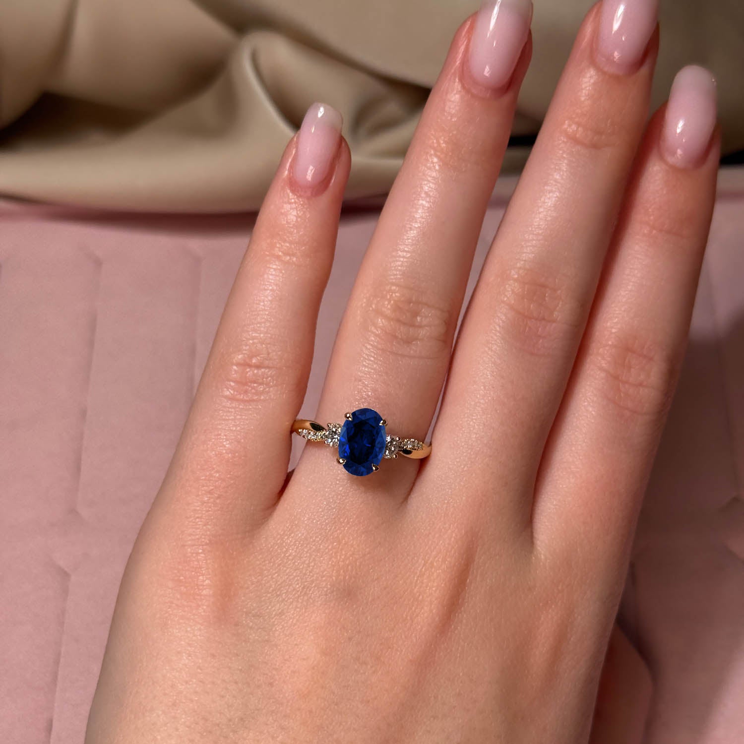 Oval Cut Twisted-Band Blue Sapphire Engagement Ring