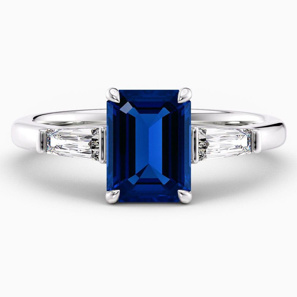 Emerald Cut Three Stone Blue Sapphire Engagement Ring - Featured Image