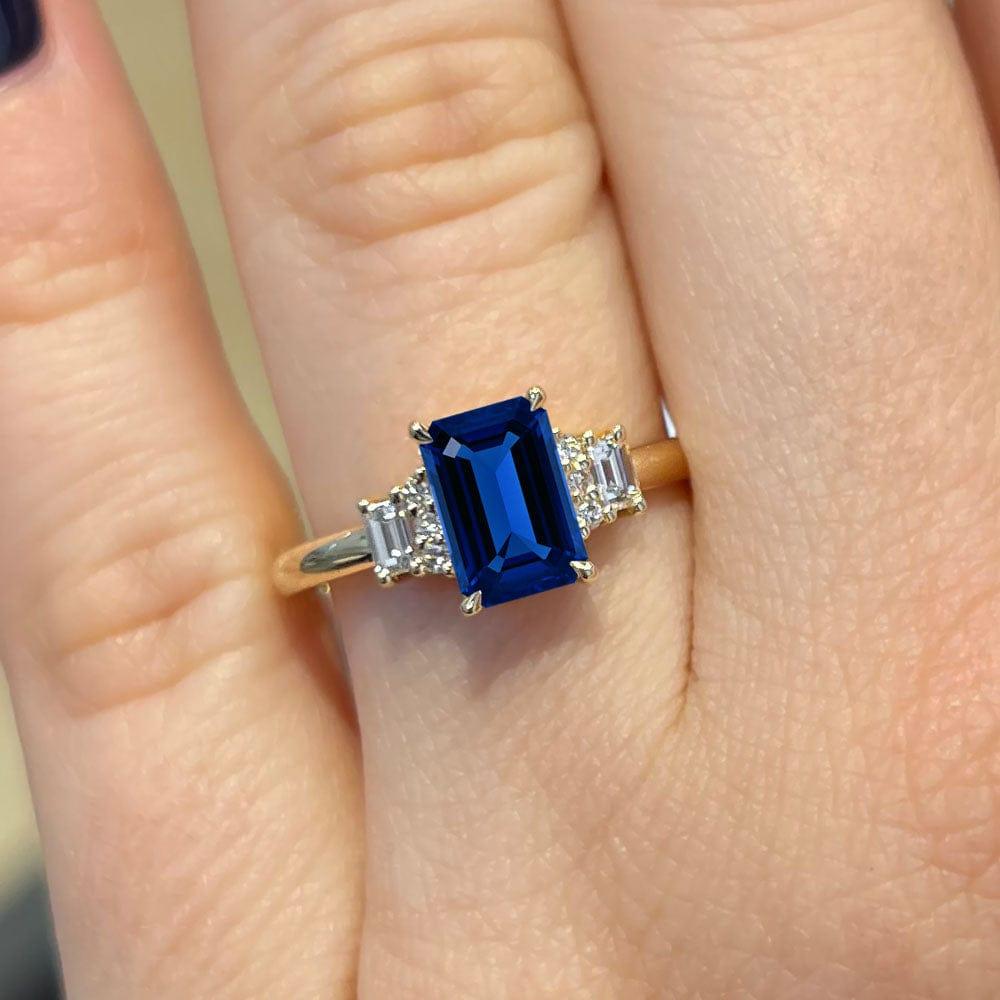 Emerald Cut Three Stone Blue Sapphire Engagement Ring