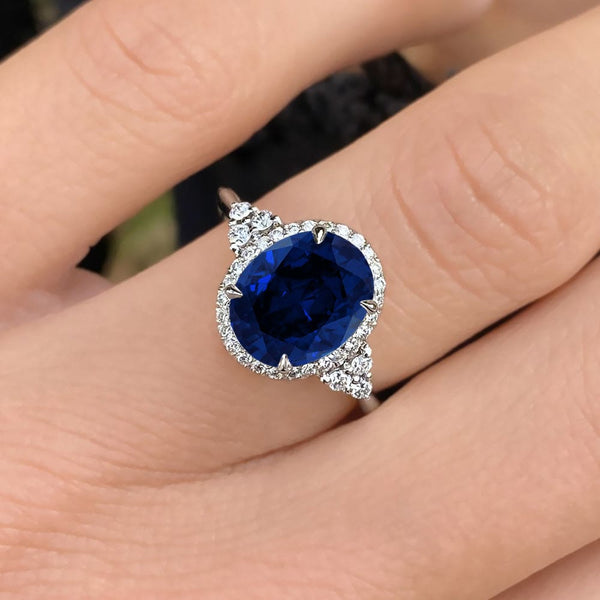 Oval Cut Blue Sapphire Halo Engagement Ring