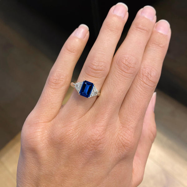 3 Carat Emerald Shape Three Stone Blue Sapphire Engagement Ring
