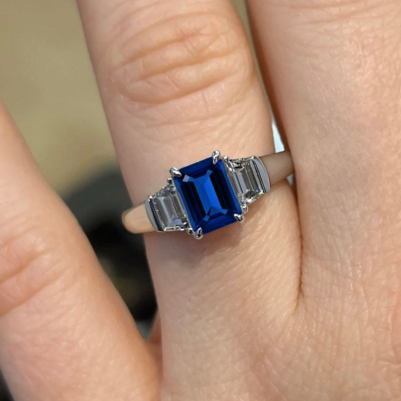 Emerald Cut Three Stone Blue Sapphire Engagement Ring