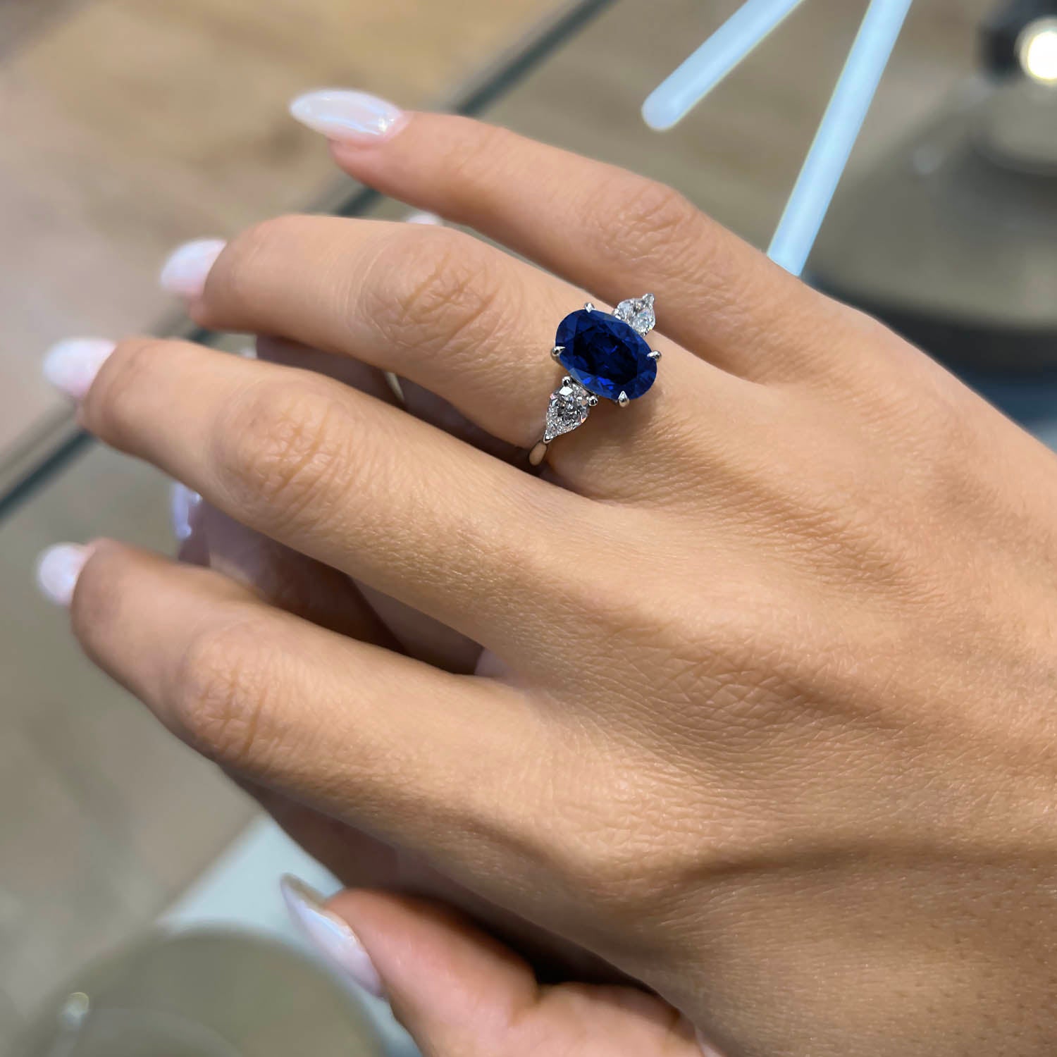 Oval Cut Three Stone Blue Sapphire Engagement Ring