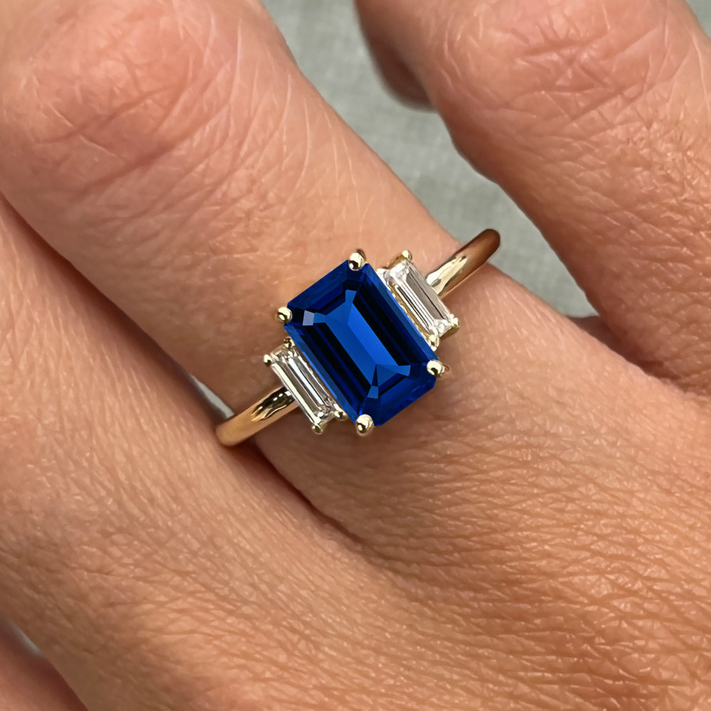 Emerald Cut Three Stone Blue Sapphire Engagement Ring