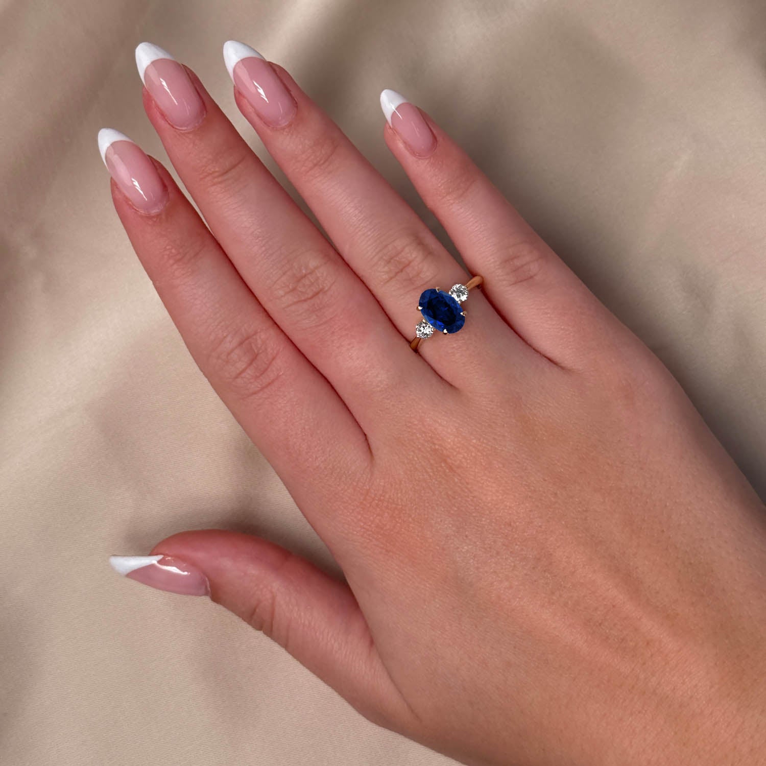 Oval Cut Three Stone Blue Sapphire Engagement Ring