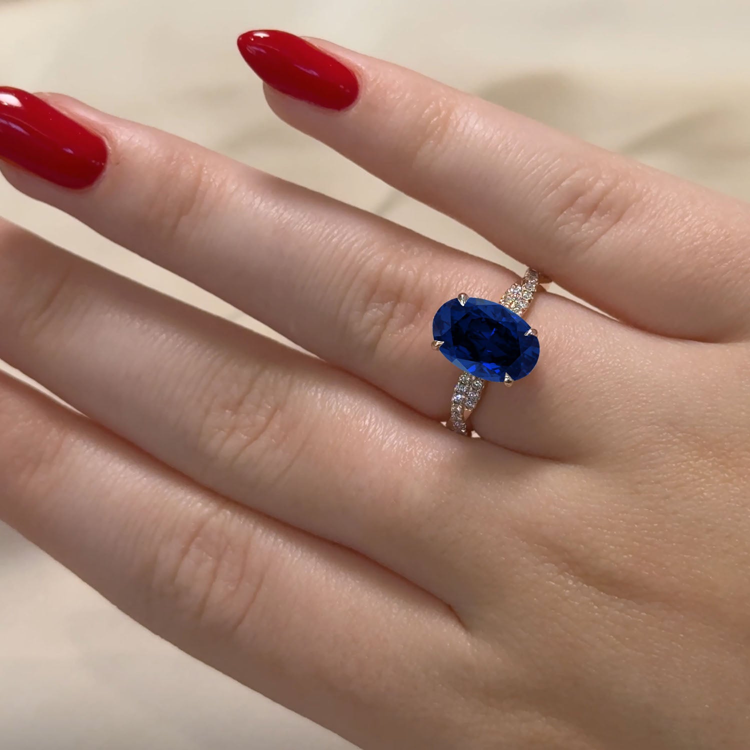 Oval Cut Twisted-Band Blue Sapphire Engagement Ring