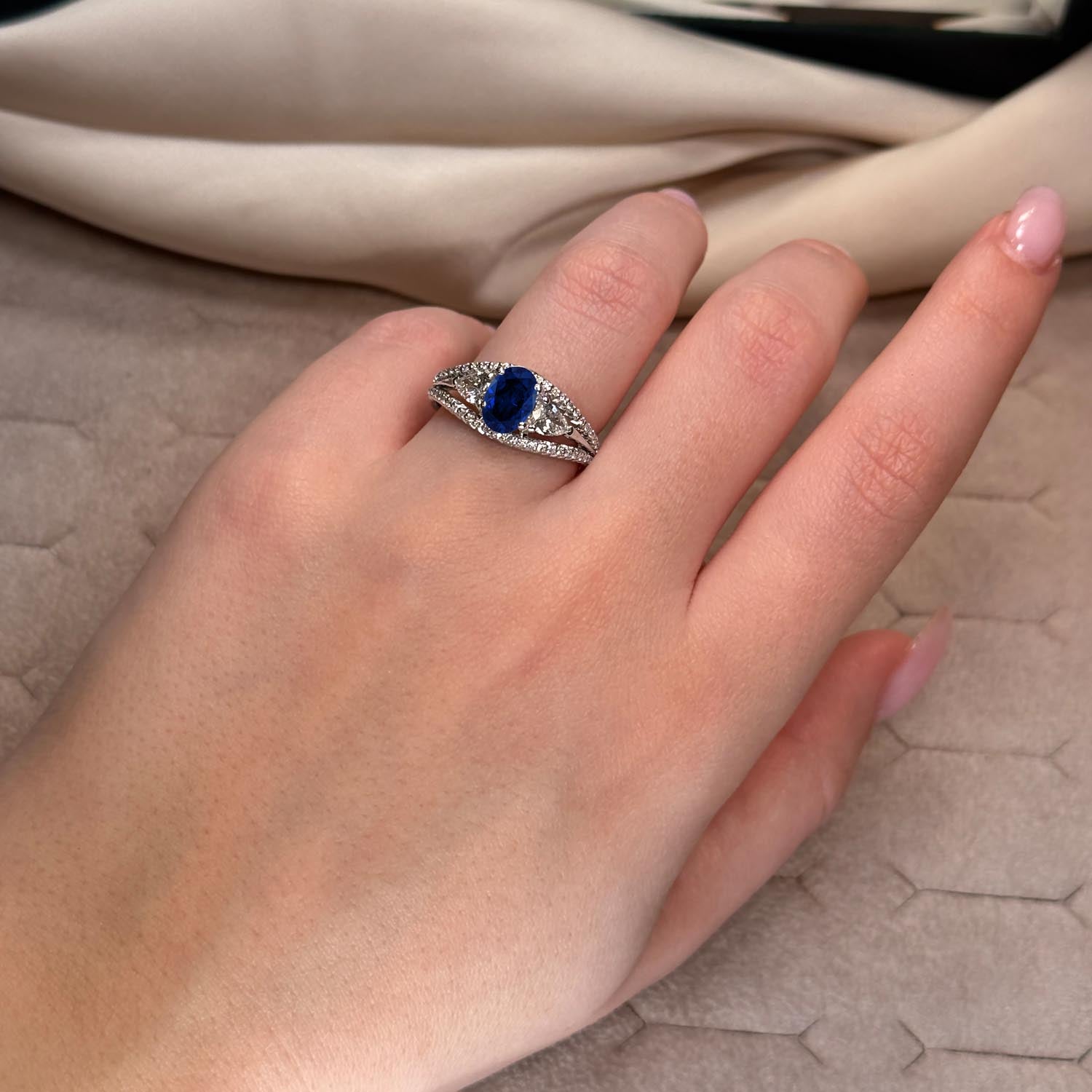 Oval Cut Three Stone Blue Sapphire Engagement Ring