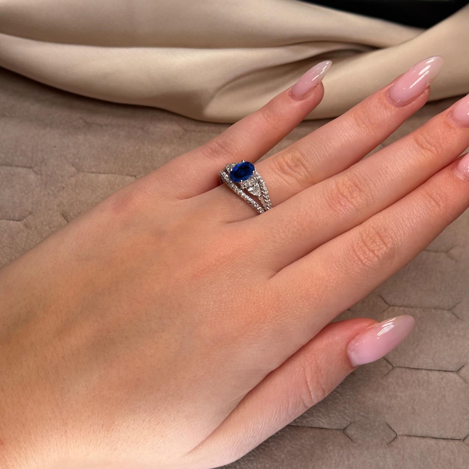 Oval Cut Three Stone Blue Sapphire Engagement Ring