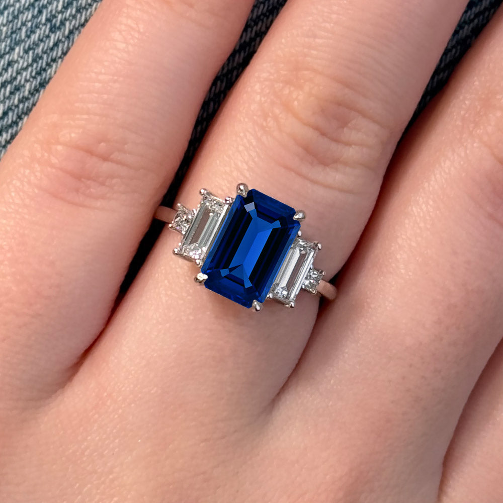 Emerald Cut Three Stone Blue Sapphire Engagement Ring