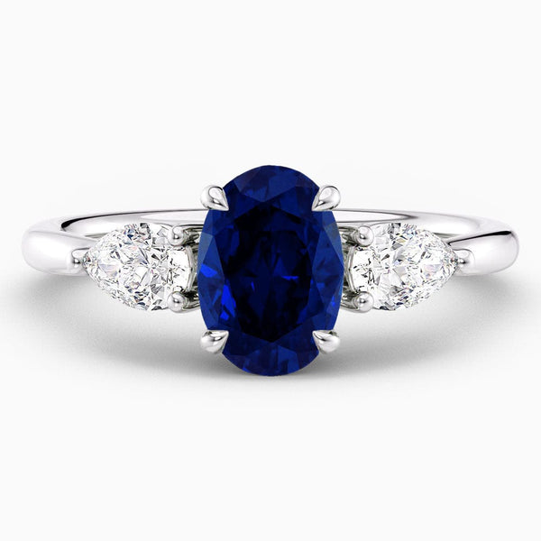 1.90 Carat Oval Shape Three Stone Blue Sapphire Engagement Ring