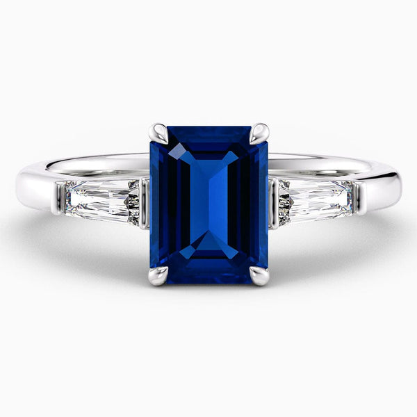 2 Carat Emerald Shape Three Stone Blue Sapphire Engagement Ring