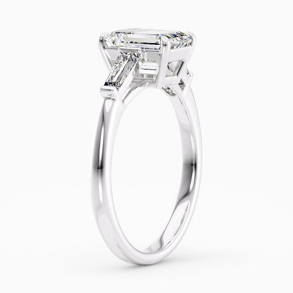 2 Carat Emerald Shape Three Stone Blue Sapphire Engagement Ring