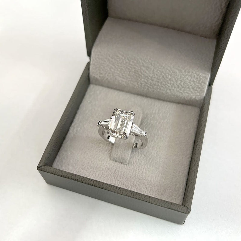 4.15 Carat Emerald Shape Three Stone Moissanite Engagement Ring